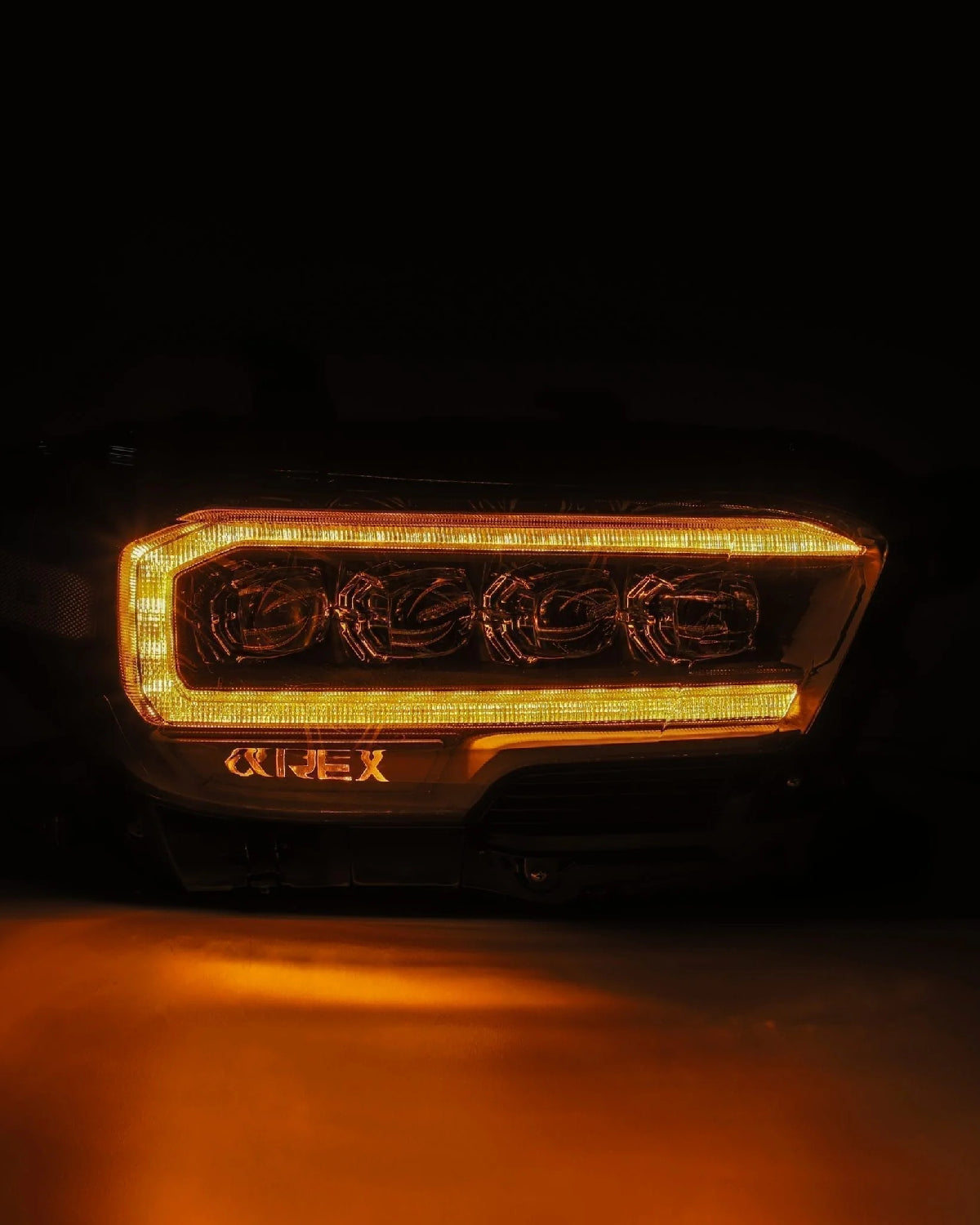 AlphaRex Nova-Series Sequential LED Projector Headlights with White/Amber DRL and Black Housing for 3rd-Gen Tacoma TRD with OEM Halogen Headlights (2016–2020) - Pair