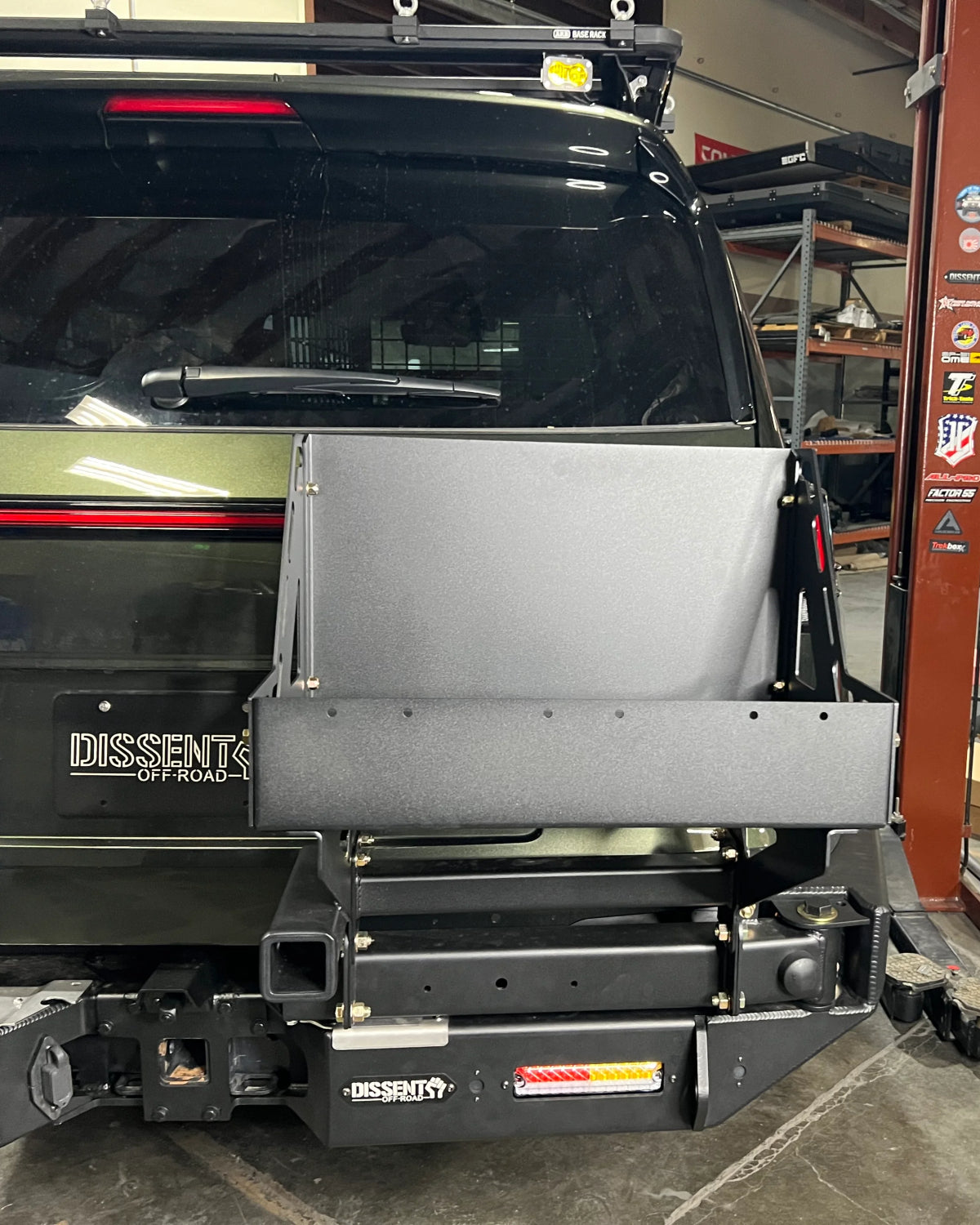 Dissent Off-Road Swing-Out Triple Jerry Can Carrier