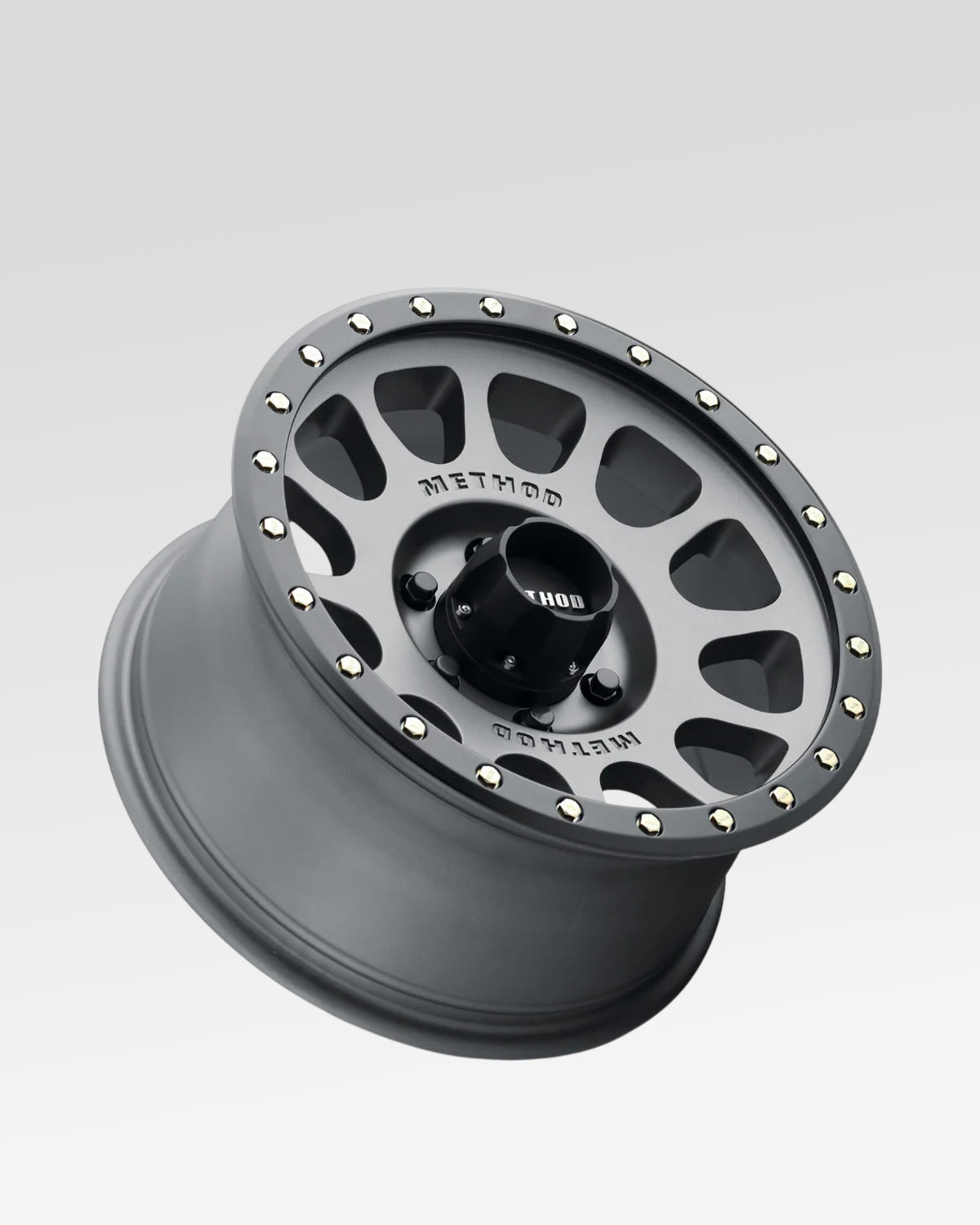 Method Race Wheels 305 18 x 9 in Wheel in Titanium Gray with Matte Black Lip with 18 mm Offset and 6 x 139.7 mm Bolt Pattern