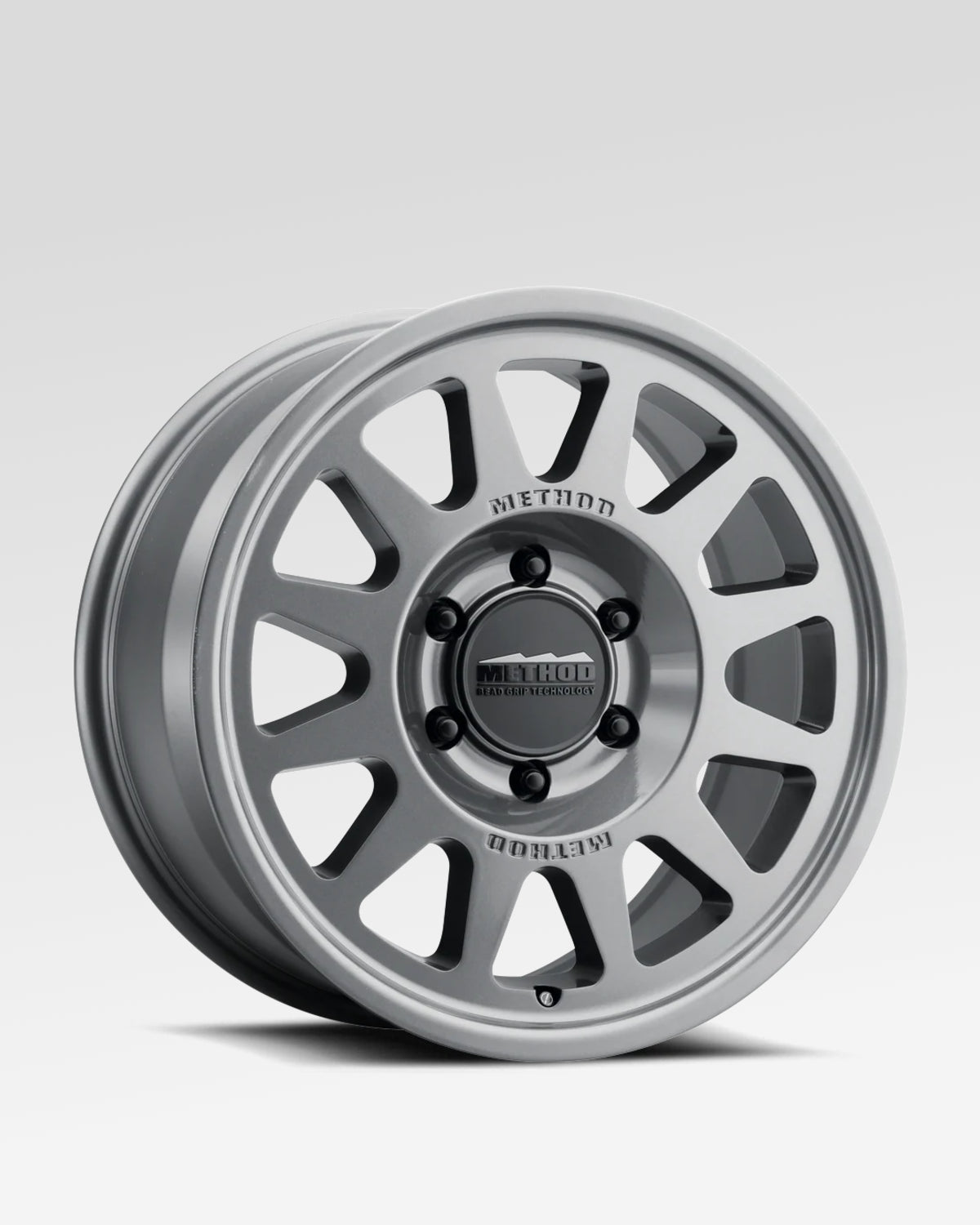Method Race Wheels 703-HD Bead Grip 18 x 9 in Bead-Retention Wheel in Gloss Titanium Gray with 40 mm Offset and 6 x 139.7 mm Bolt Pattern