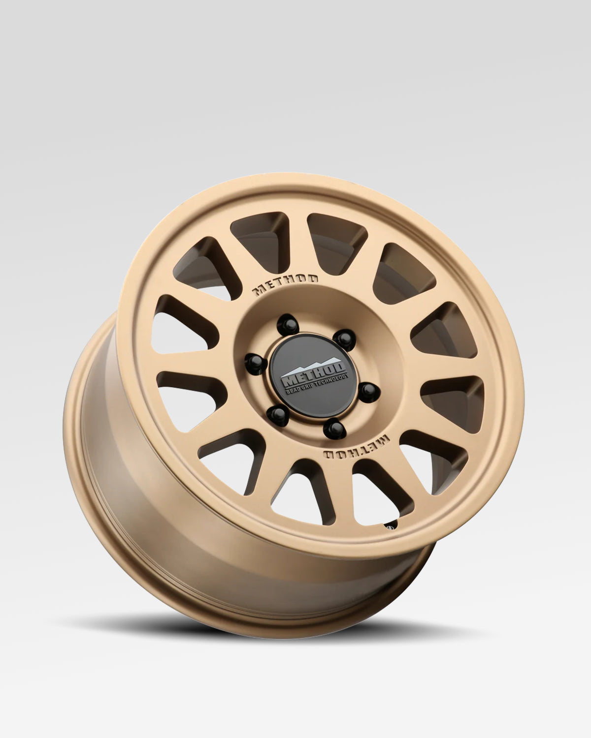 Method Race Wheels 703-HD Bead Grip 18 x 9 in Bead-Retention Wheel in Method Bronze with 40 mm Offset and 6 x 139.7 mm Bolt Pattern