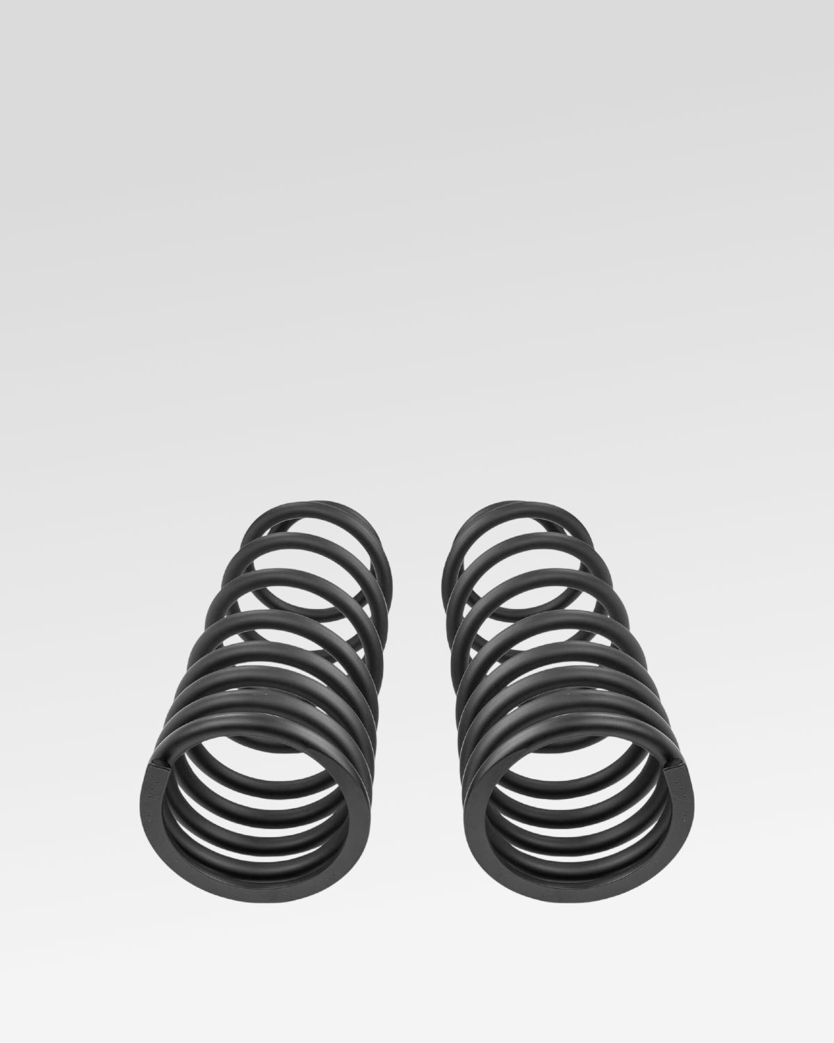 Old Man Emu Rear Dual-Rate Coil Springs in Black with 160–285 lbf/in Spring Rate and 18.5 in Free Height for Land Cruiser 250 Series (2024–Present) - Pair