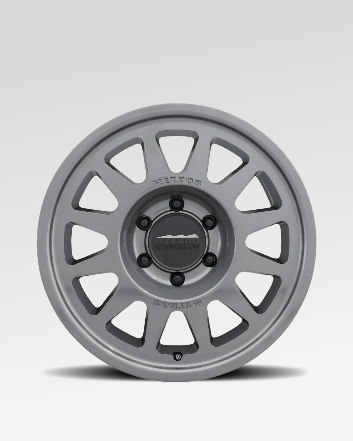 Method Race Wheels 703-HD Bead Grip 18 x 9 in Bead-Retention Wheel in Gloss Titanium Gray with 40 mm Offset and 6 x 139.7 mm Bolt Pattern