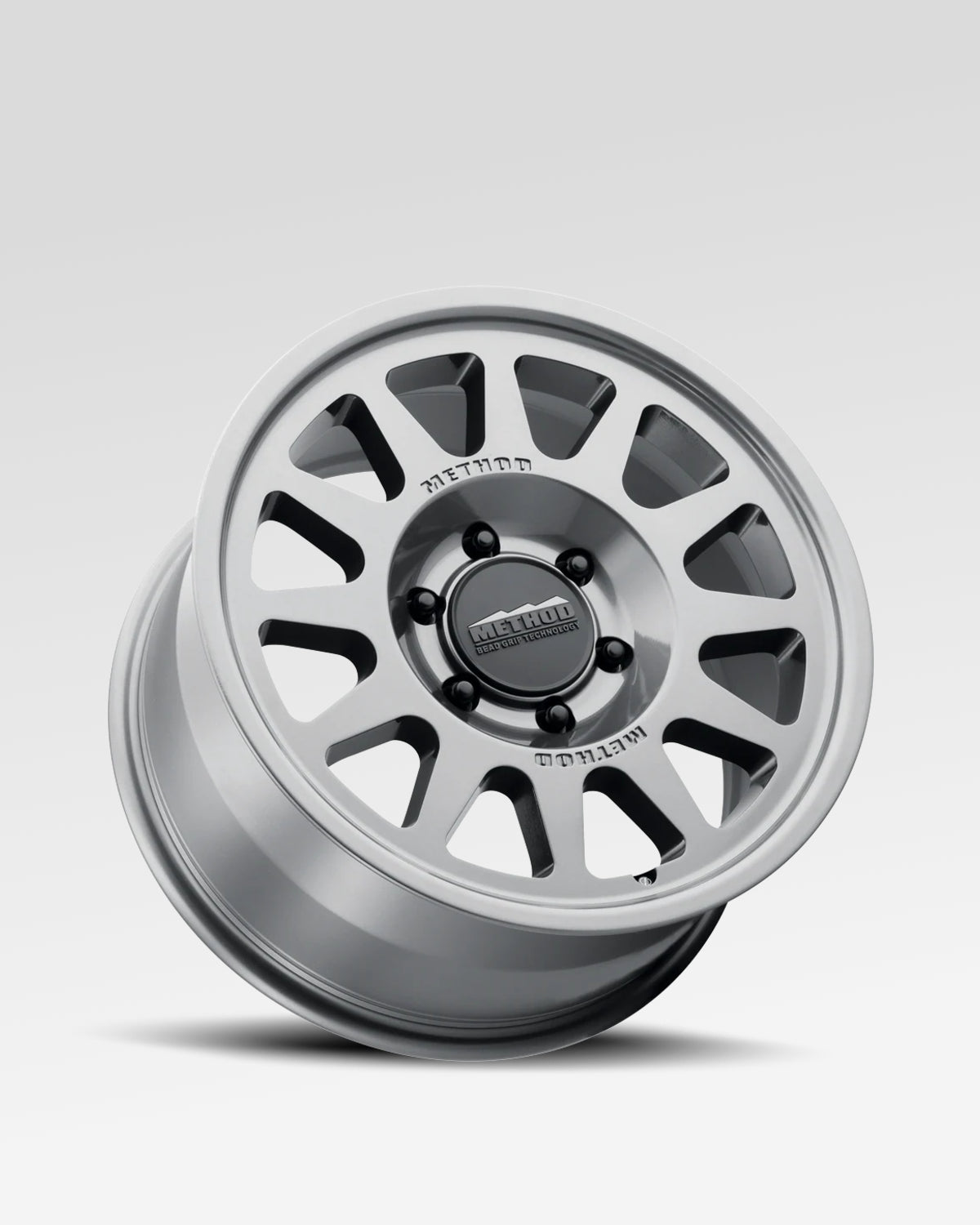 Method Race Wheels 703-HD Bead Grip 18 x 9 in Bead-Retention Wheel in Gloss Titanium Gray with 40 mm Offset and 6 x 139.7 mm Bolt Pattern