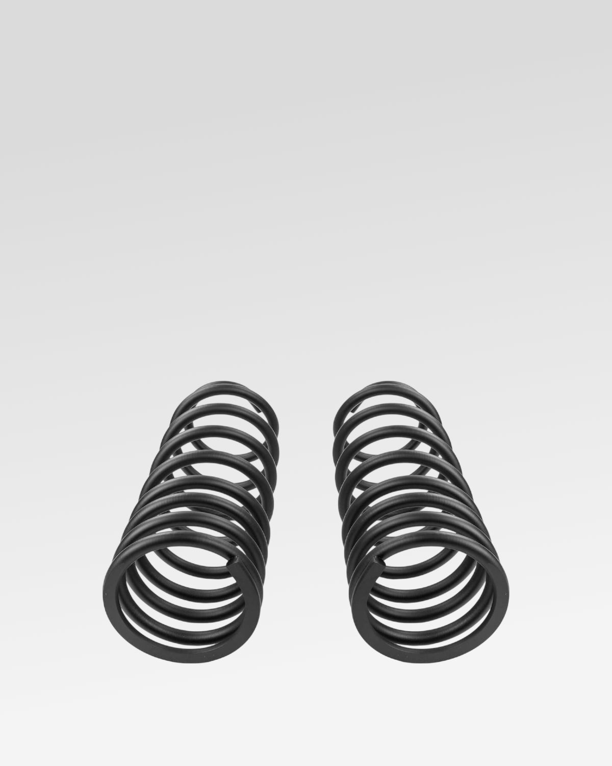 Old Man Emu Rear Dual-Rate Coil Springs in Black with 143–257 lbf/in Spring Rate and 18.3 in Free Height for Land Cruiser 250 Series (2024–Present) - Pair