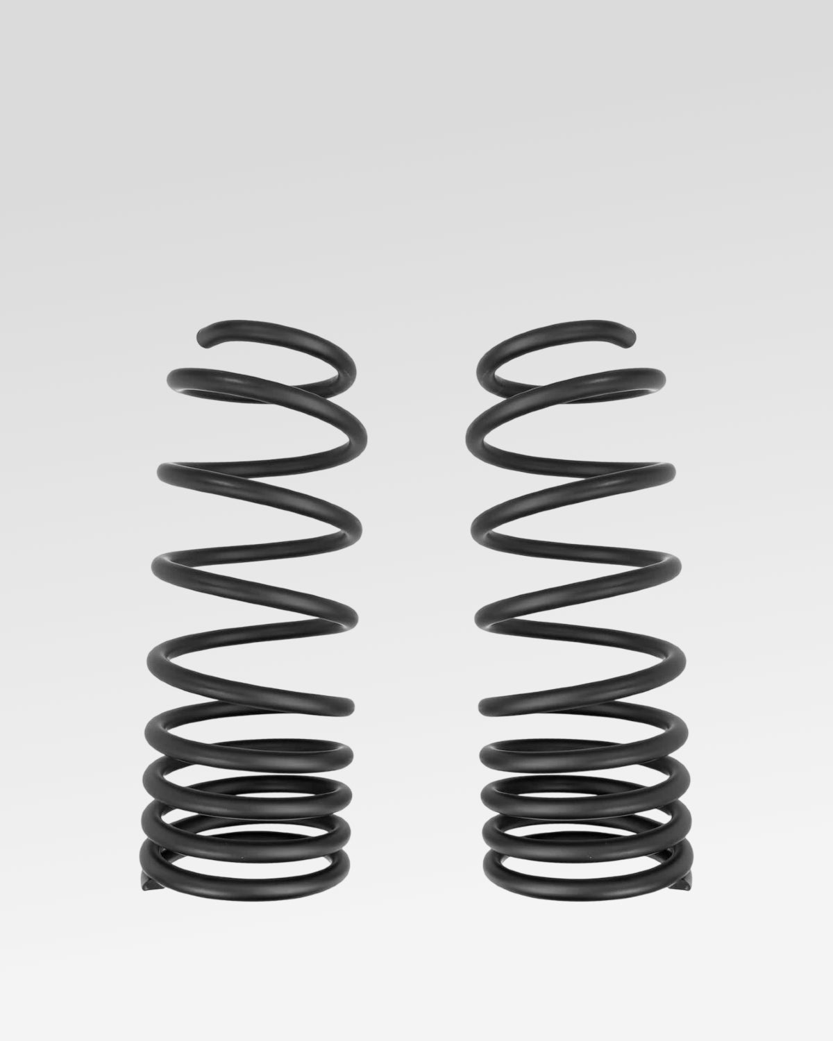 Old Man Emu Rear Dual-Rate Coil Springs in Black with 160–285 lbf/in Spring Rate and 18.5 in Free Height for Land Cruiser 250 Series (2024–Present) - Pair