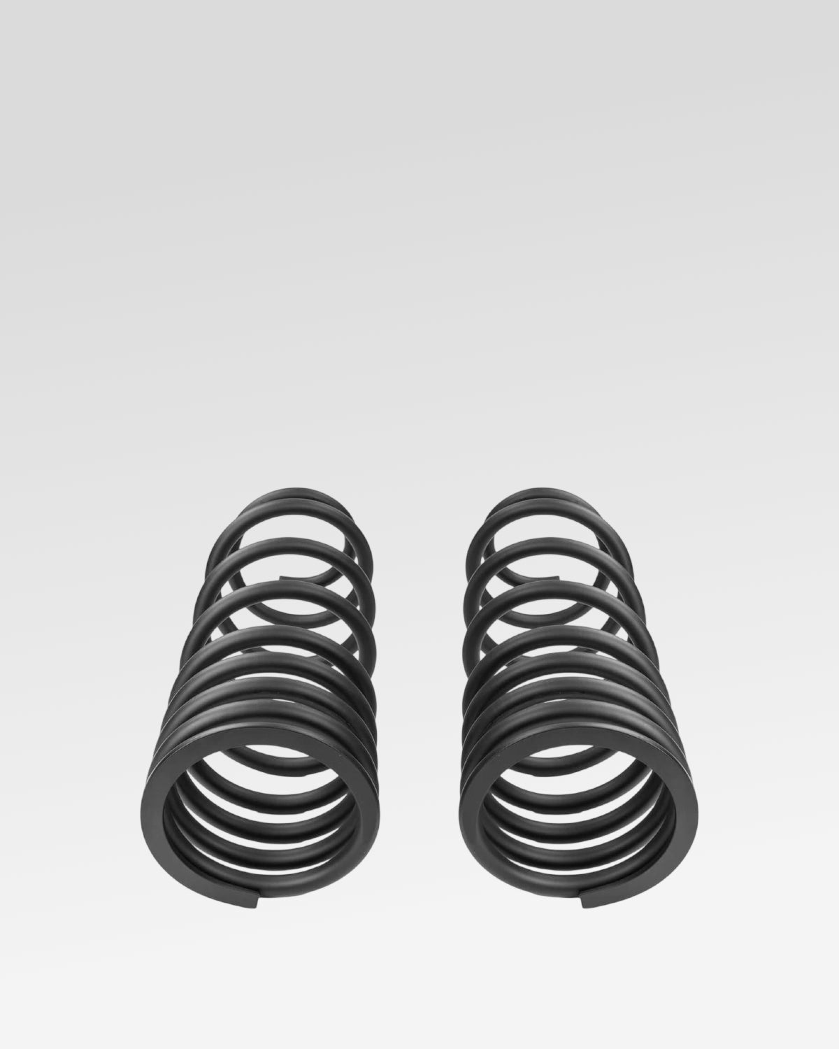 Old Man Emu Rear Dual-Rate Coil Springs in Black with 160–285 lbf/in Spring Rate and 19.3 in Free Height for Land Cruiser 250 Series (2024–Present) - Pair